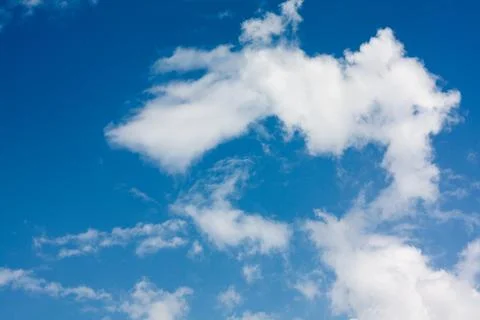 Blue sky background with cumulus clouds Stock Photos