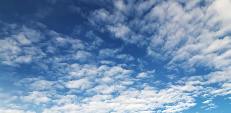 Blue sky background with fluffy clouds Stock Photos