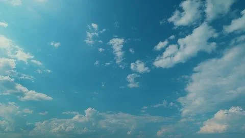 Blue Sky Background With Many Layers Tiny Altocumulus Clouds. Motion Movement Stock Photos