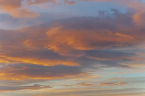 Blue sky background with red clouds at sunset Stock Photos