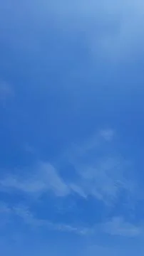 Blue sky background with thin clouds in Indonesian sky Stock Photos