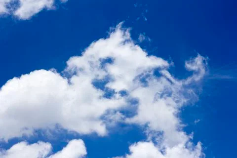 Blue sky background with tiny clouds Stock Photos