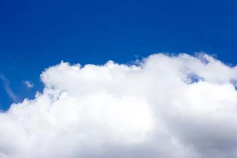Blue sky background with tiny clouds Stock Photos