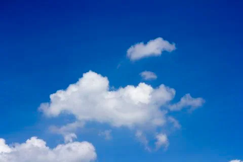 Blue sky background with tiny clouds Stock Photos
