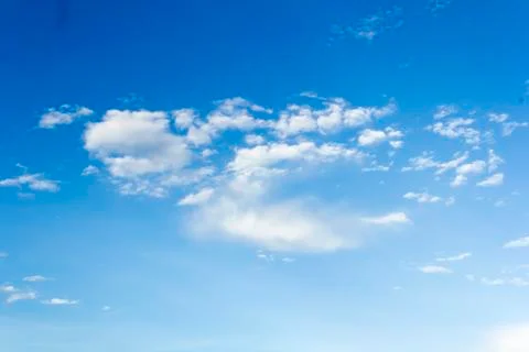 Blue sky background with tiny clouds Stock Photos