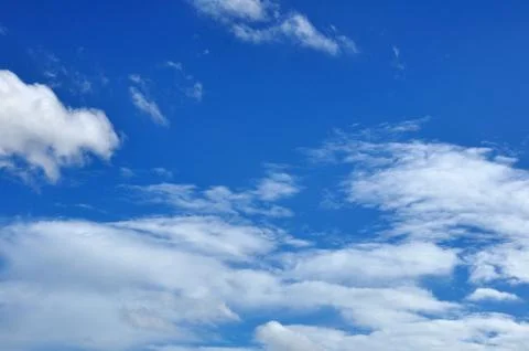 Blue sky background with tiny clouds Stock Photos