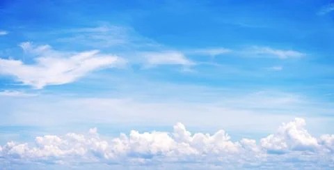Blue sky background with tiny clouds Stock Photos