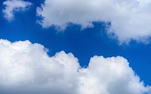 Blue sky background with tiny clouds Stock Photos