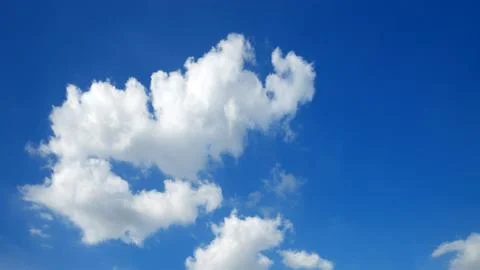Blue sky background with tiny clouds Stock Photos