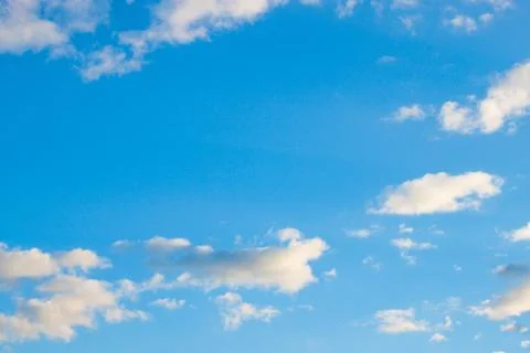 Blue sky background with tiny clouds Stock Photos
