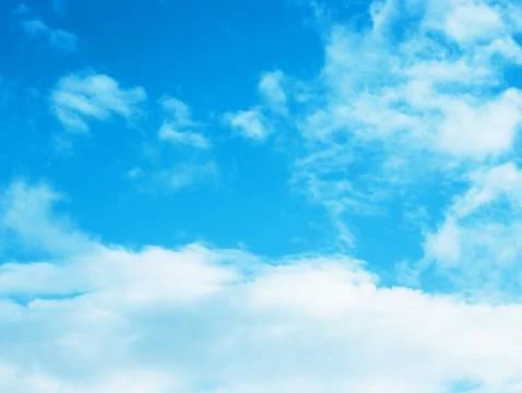 Blue sky background with tiny clouds Stock Photos