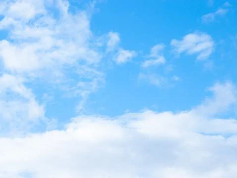 Blue sky background with tiny clouds Stock Photos