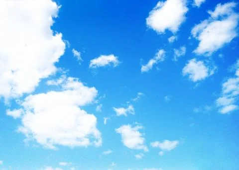 Blue sky background with tiny clouds Stock Photos