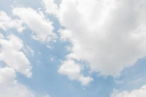 Blue sky background with tiny clouds Stock Photos