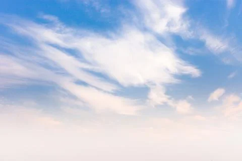 Blue sky background with tiny clouds Stock Photos