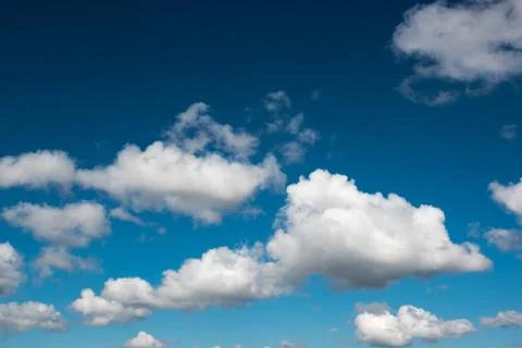 Blue sky background with tiny clouds Stock Photos