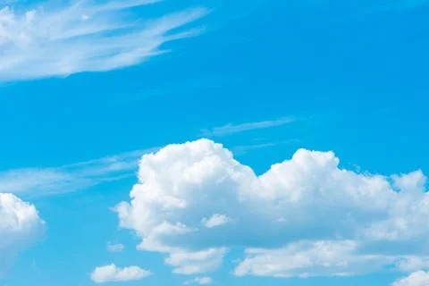 Blue sky background with tiny clouds Stock Photos