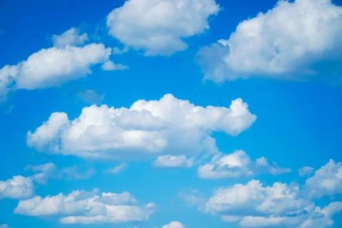 Blue sky background with tiny clouds Stock Photos