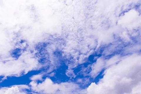 Blue sky background with tiny clouds Stock Photos