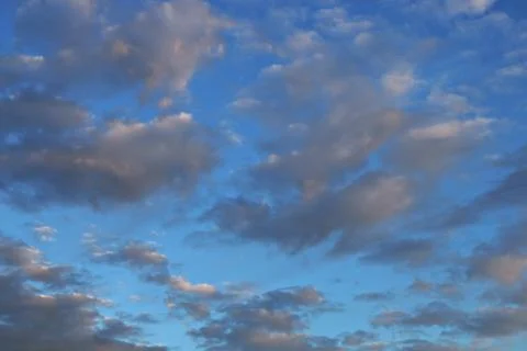 Blue sky background with tiny clouds Stock Photos
