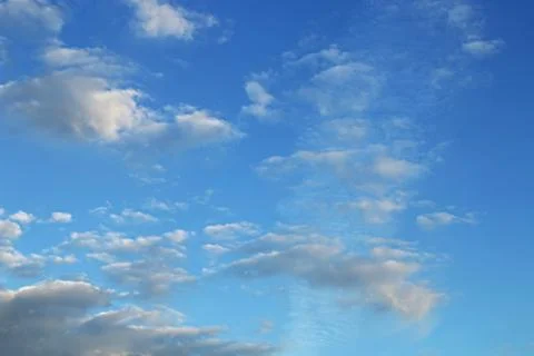 Blue sky background with tiny clouds Stock Photos