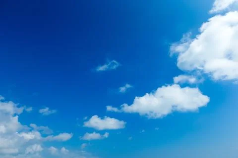 Blue sky background with tiny clouds Stock Photos