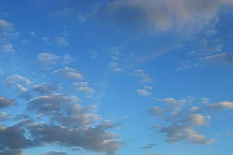 Blue sky background with tiny clouds Stock Photos