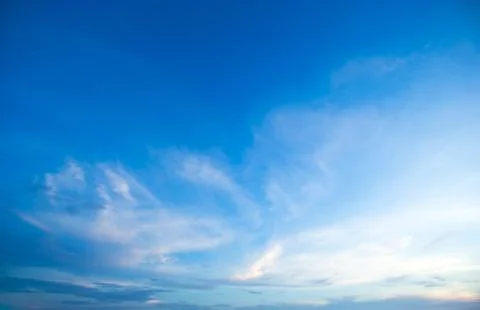 Blue sky background with tiny clouds Stock Photos