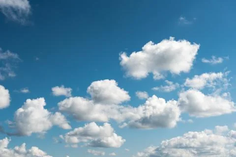 Blue sky background with tiny clouds Stock Photos