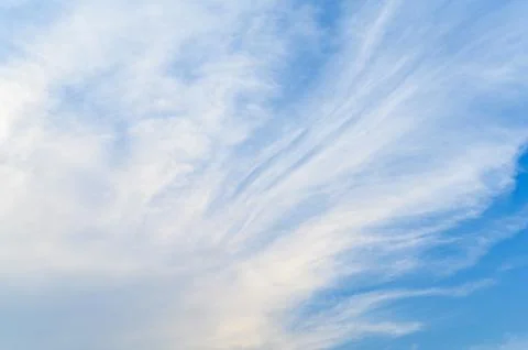 Blue sky background with tiny clouds Stock Photos