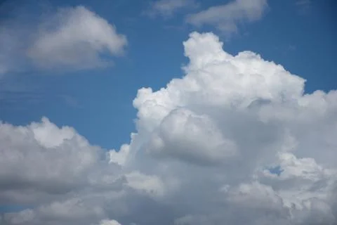 Blue sky background with tiny clouds. Stock Photos
