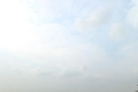 Blue sky background with tiny clouds Stock Photos
