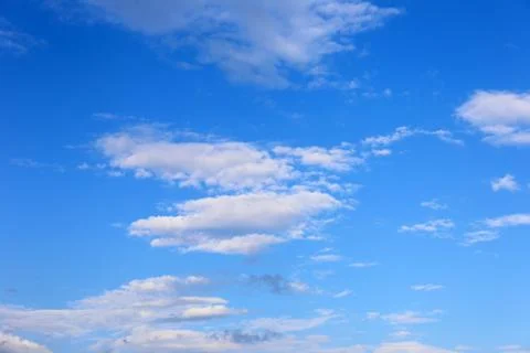 Blue sky background with tiny clouds. Foto stock