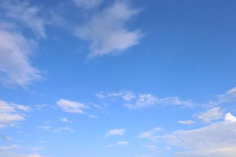 Blue sky background with tiny clouds. 写真素材
