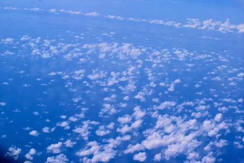 Blue sky background with tiny clouds Stock Photos
