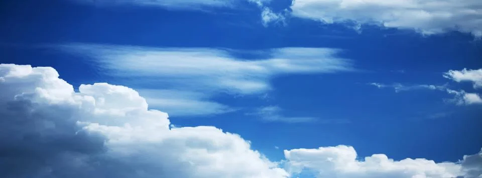 Blue Sky Background with tiny Clouds. Panorama Stock Photos
