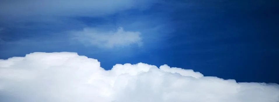 Blue Sky Background with tiny Clouds. Panorama Stock Photos