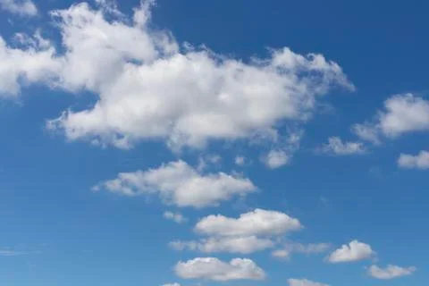 Blue sky background with tiny clouds. Stock Photos