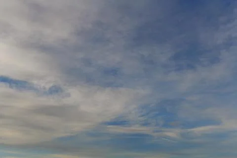 Blue sky background with tiny clouds in the afternoon Stock Photos
