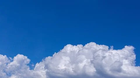 Blue sky background with tiny clouds Stock Photos