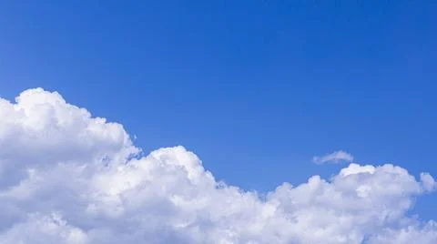 Blue sky background with tiny clouds for design Stockfoto's