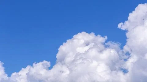 Blue sky background with tiny clouds for design Фото