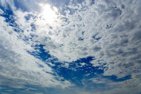 Blue sky background with tiny clouds Fotos Stock