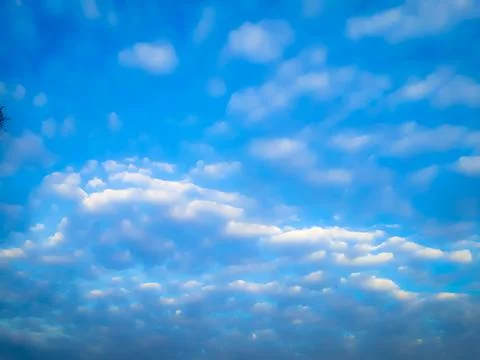 Blue sky background with tiny clouds 스톡 사진