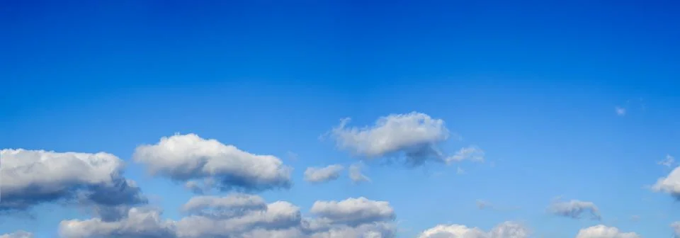 Blue sky background with tiny clouds. Panorama Foto stock