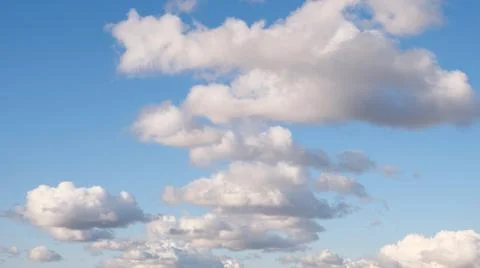 Blue sky background with tiny clouds Foto stock
