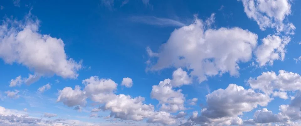 Blue sky background with tiny clouds Foto stock