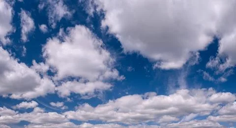Blue sky background with tiny clouds Foto stock