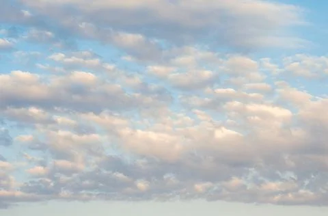Blue sky background with tiny clouds Stock Photos