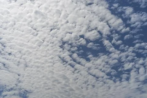 Blue sky background with tiny clouds Stock Photos